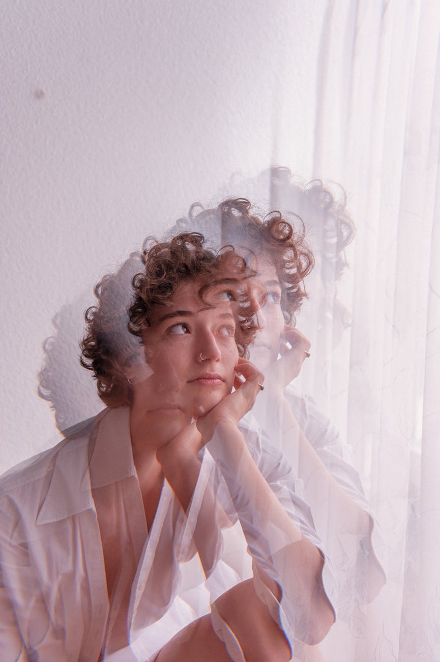 a woman in white long sleeve shirt