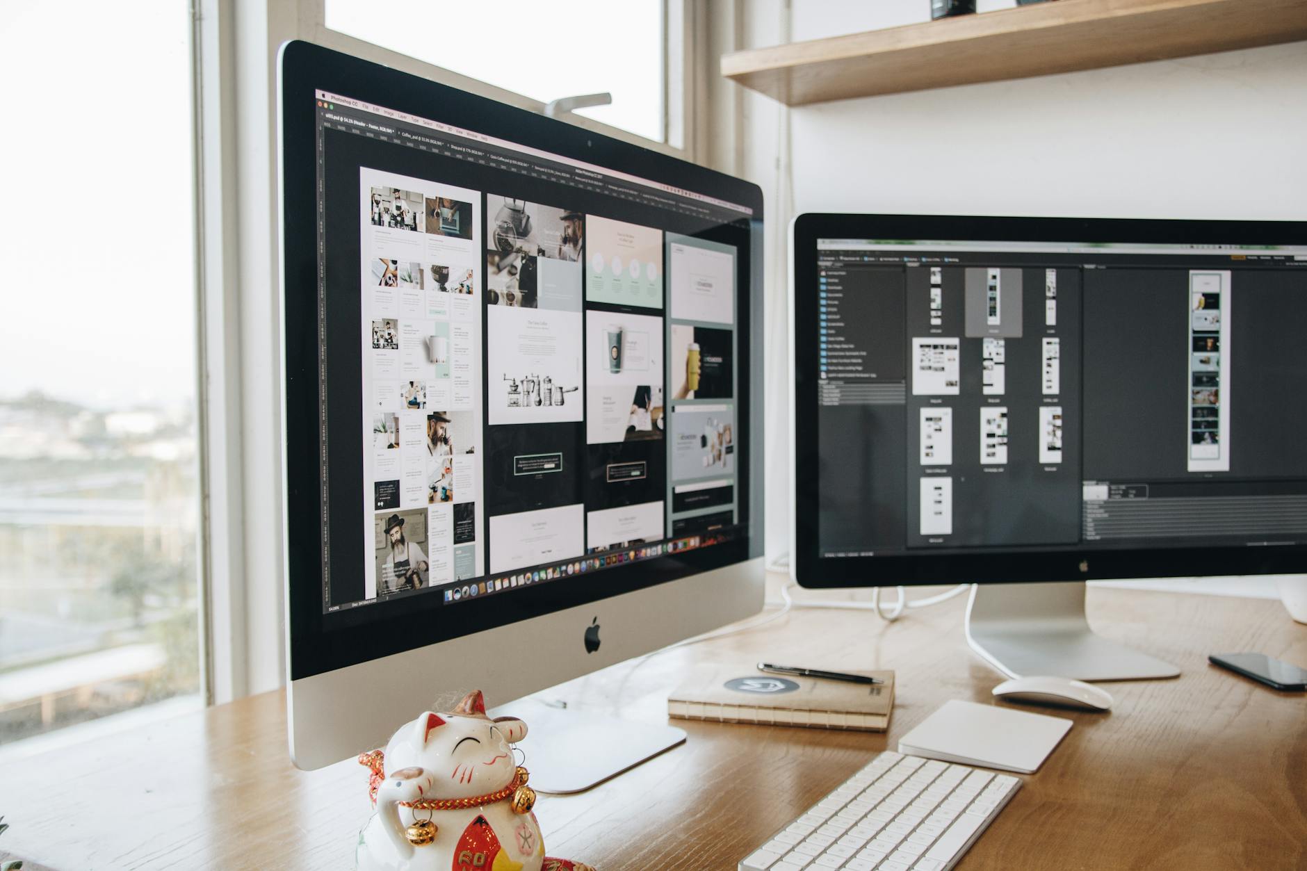 two turned on silver imacs
